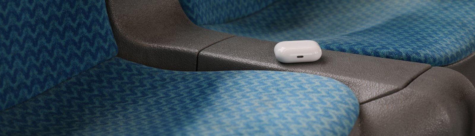 ear pods sitting on a bus seat
