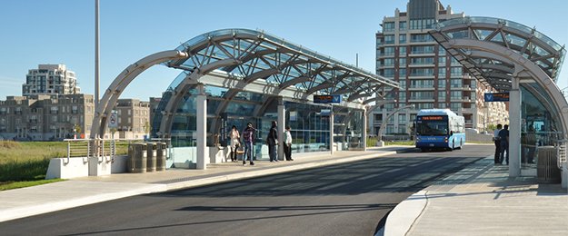 A bus pulling into a Rapidway terminal